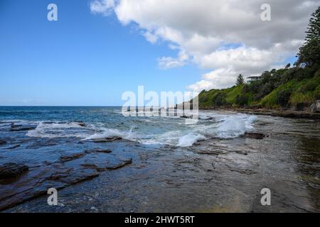 waves breaking on rocks in Australia Stock Photo