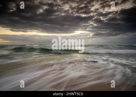 Coastal sunrise over the Pacific Ocean in Australia Stock Photo