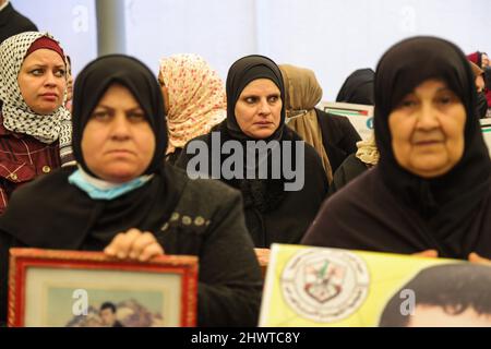 Gaza, Palestine. 07th Mar, 2022. Relatives of Palestinian prisoners take part in an event supporting their sons in the Israeli jails before one day of the international women's day in the ICRC office in Gaza City. Credit: SOPA Images Limited/Alamy Live News Stock Photo