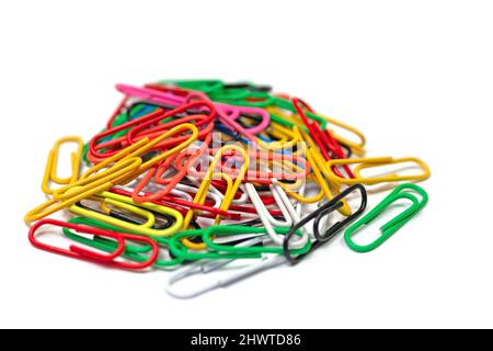 Lots of colorful paper clips against a white background Stock Photo