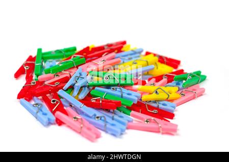Colorful clothespins against white background Stock Photo