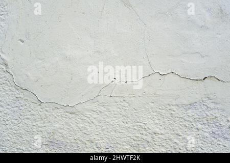 surface of concrete gray wall  in cracks Stock Photo