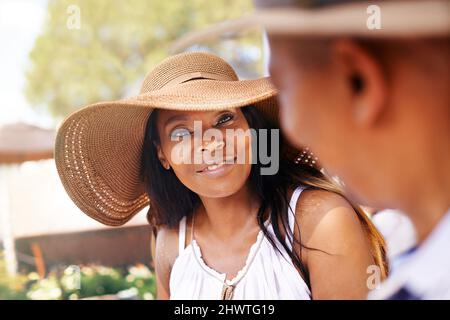 Taking time out for one another. Cropped shot of a mature couple talking in their frontyard. Stock Photo