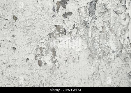 Cracked wall background. Cement white texture with cracks Stock Photo