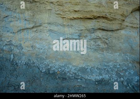 Masonry coarseness beach top view. Oceanfront structure. Costal roughness on ocean beach with natural light. multicolor pebbles. Aqua paving stone. Sl Stock Photo