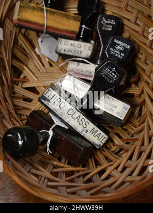 A selectioin of vintage rubber stamps for sale in an antique shop in Santa Fe, New Mexico, including one for third class mail. Stock Photo