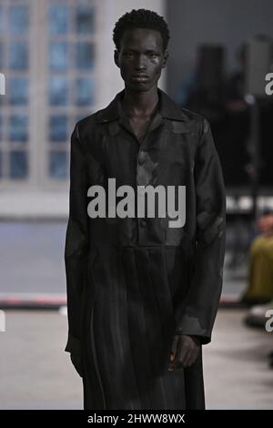 Model Mamuor Majeng walks on the runway at the Isabel Marant fashion ...