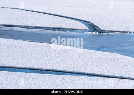 Helsinki / Finland - FEBRUARY 26, 2022: closeup of a melting sea ice cover Stock Photo