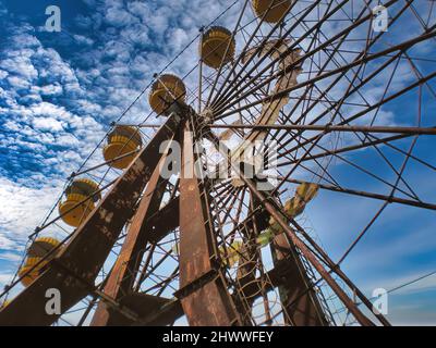 Abandoned Ferris wheel in Pripyat amusement park, where the famous Chernobyl nuclear accident occurred in 1986. Stock Photo