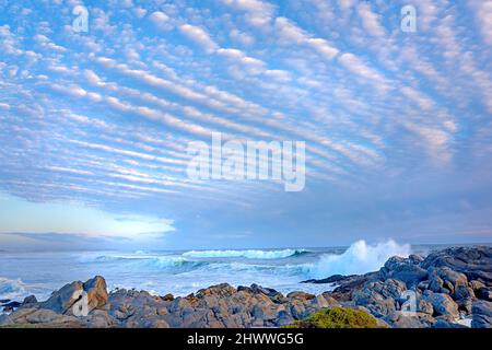 Sunset by the coast - Western Cape, Cape Town. Sunset by the sea - Western Cape, South Africa. Stock Photo