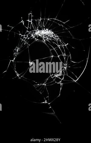 broken glass dark background texture, Cracked touch screen phone. Stock Photo