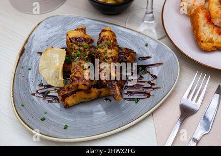 Top view of breaded eggplant or aubergine seasoned with cane honey Stock Photo