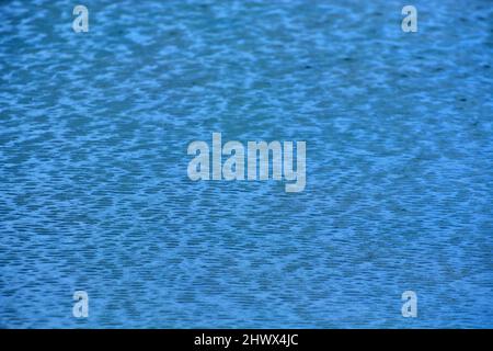 Blue sea waving water for background Stock Photo - Alamy