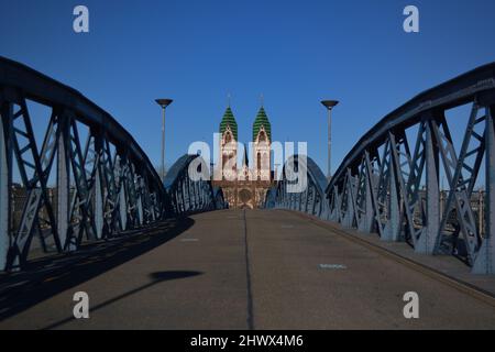 Bridge in Freiburg with Herz Jesu church Stock Photo