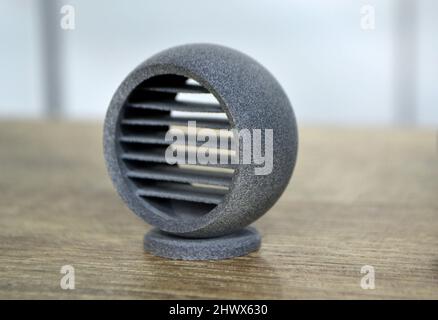 Gray abstract model object printed on 3d printer from powder close-up ...