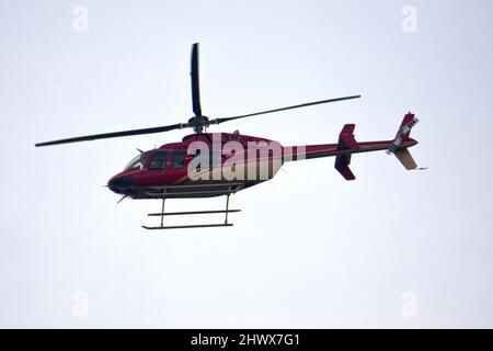 Helicopter in flight Stock Photo