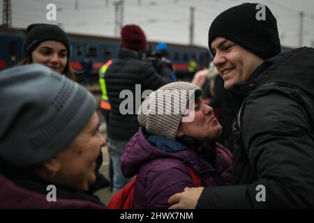 Zahony, Hungary - March 7, 2022: refugees from Ukraine arrive at the Zahony border train station after Russia launched a full-scale military operation in the country Stock Photo