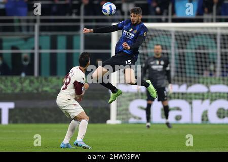 Milan, Italy, 4th March 2022. Andrea Ranocchia of FC Internazionale heads the ball clear from Diego Perotti of Salernitana during the Serie A match at Giuseppe Meazza, Milan. Picture credit should read: Jonathan Moscrop / Sportimage Stock Photo