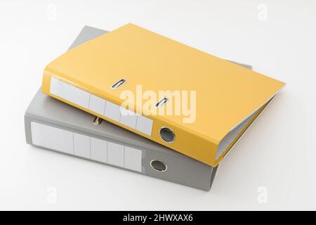 Yellow and gray office folder on white background Stock Photo - Alamy