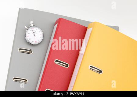 Yellow, red  and gray office folders on the white background. Stock Photo