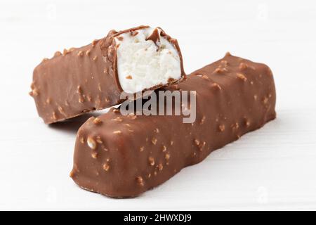 Two chocolate ice cream bars on white background close up macro shot Stock Photo