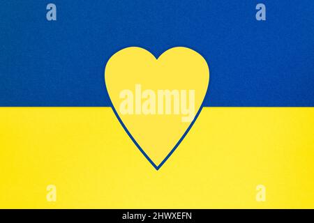Wallpaper horizontal background with the shape of a heart in the national colors of Ukraine, blue and yellow. Stock Photo