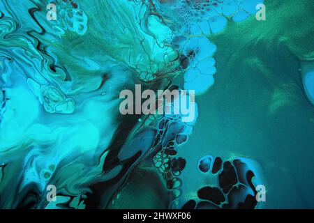 Fluid Art. Metallic Green and blue abstract wave swirls on black ...