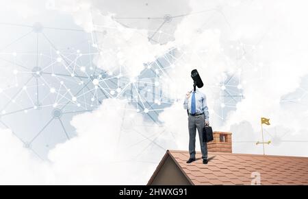 Concept of security and privacy protection with camera headed man Stock Photo
