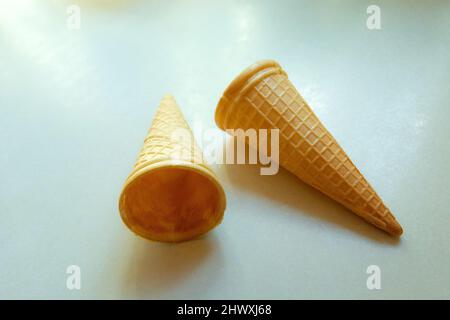 Empty wafers for ice cream on a white countertop Stock Photo