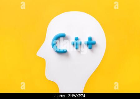 C++ programming language sign inside a humans head. Concept of programming learning, language coding software technology. Stock Photo
