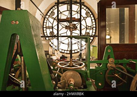 The mechanics of time. Clockwork machinery inside a clock tower. Stock Photo
