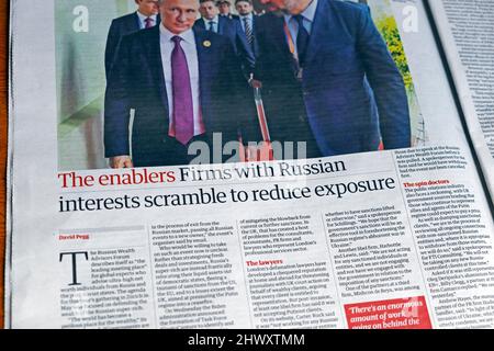 'The enablers Firms with Russian interests scramble to reduce exposure' Russian business Guardian newspaper headline clipping 5 March 2022 London UK Stock Photo