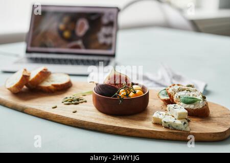 Close up of gourmet setup at food photographers studio with computer in background, copy space Stock Photo