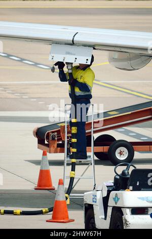 Passenger Jet getting refuelled, rising fuel prices, fuel crisis