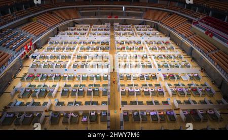 Beijing, China. 12th Feb, 2020. Photo taken on Feb. 12, 2020 shows the interior view of a temporary hospital converted from Wuhan Sports Center in Wuhan, central China's Hubei Province. Credit: Xiao Yijiu/Xinhua/Alamy Live News Stock Photo