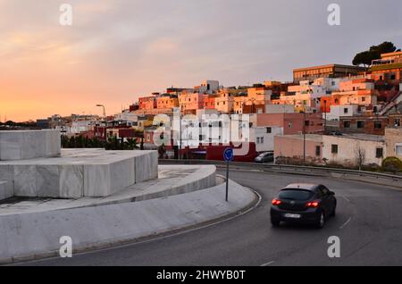 Car on the roundabout and residential neighborhood in Almeria southern Spain Europe. Stock Photo