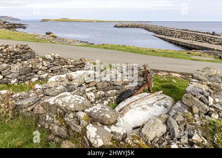 Staffin Island in Staffin Bay viewed from the slipway at Garafad on the north east coast of the Isle of Skye, Highland, Scotland UK. Stock Photo