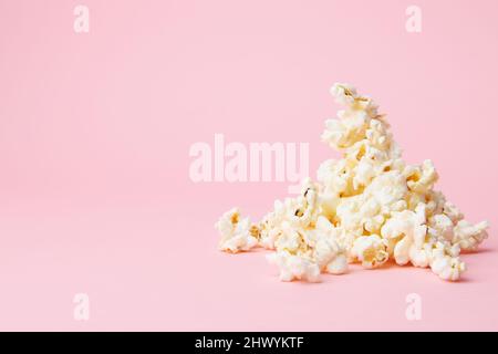 popcorn isolated on pink background Stock Photo