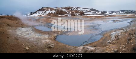 The Namafjall Geothermal Area, Iceland, on the east side of Lake Myvatn. At this area, also known as Hverir, are many smoking fumaroles Stock Photo