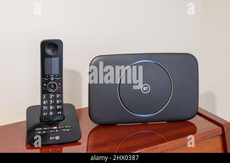 Black BT Phone with Black BT Router Stock Photo
