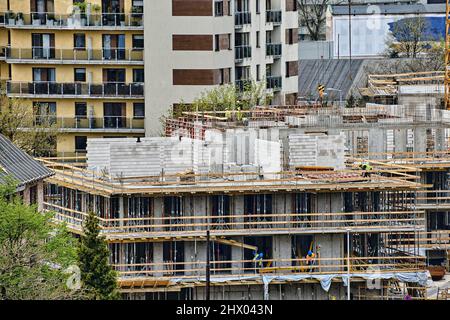 Residential building construction site, formwork, iron rebars or reinforcing bars for reinforced concrete partitions, concrete blocks for inner walls Stock Photo