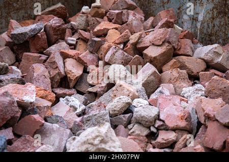 Old red bricks from demolished brick wall Stock Photo
