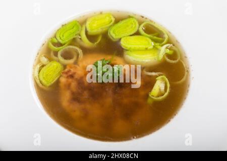 austrian cheese dumpling soup on wood Stock Photo