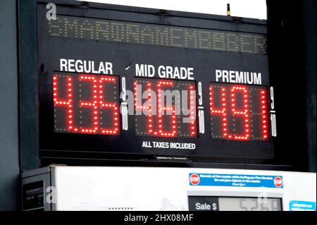 Rising gasoline prices as posted in Dennis, Massachusetts on Cape Cod, USA Stock Photo