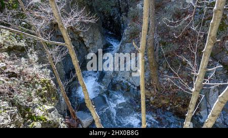 Krios river in Troodos mountains in Cyprus runs down a gorge Stock Photo