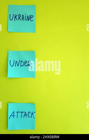 stickers with words on blue background close up. Flat lay. Concept of freedom and support. Protest action. Stop war. Stock Photo