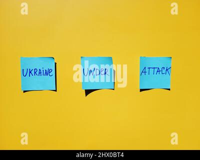 stickers with words on blue background close up. Flat lay. Concept of freedom and support. Protest action. Stop war. Stock Photo