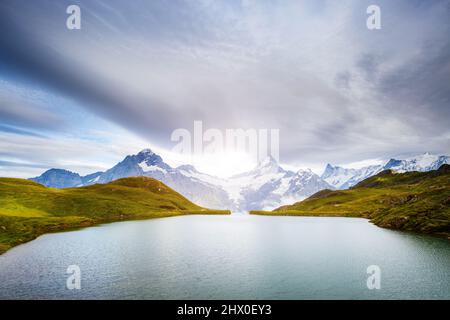 Great view of Mt. Schreckhorn and Wetterhorn above Bachalpsee lake. Dramatic and picturesque scene. Popular tourist attraction. Location Swiss alp, Be Stock Photo