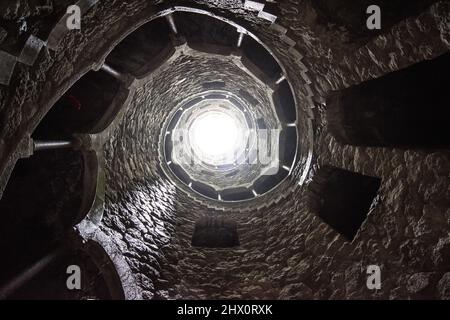 View looking up at the Initiation well, Poco Iniciato at Quinta da Regaleira, Sintra, Portugal Stock Photo