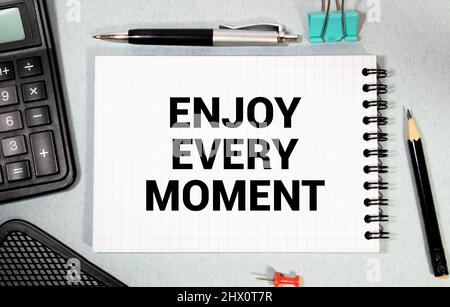 Conceptual handwriting showing Enjoy Every Moment. Business photo text being pleased with your life. Stock Photo